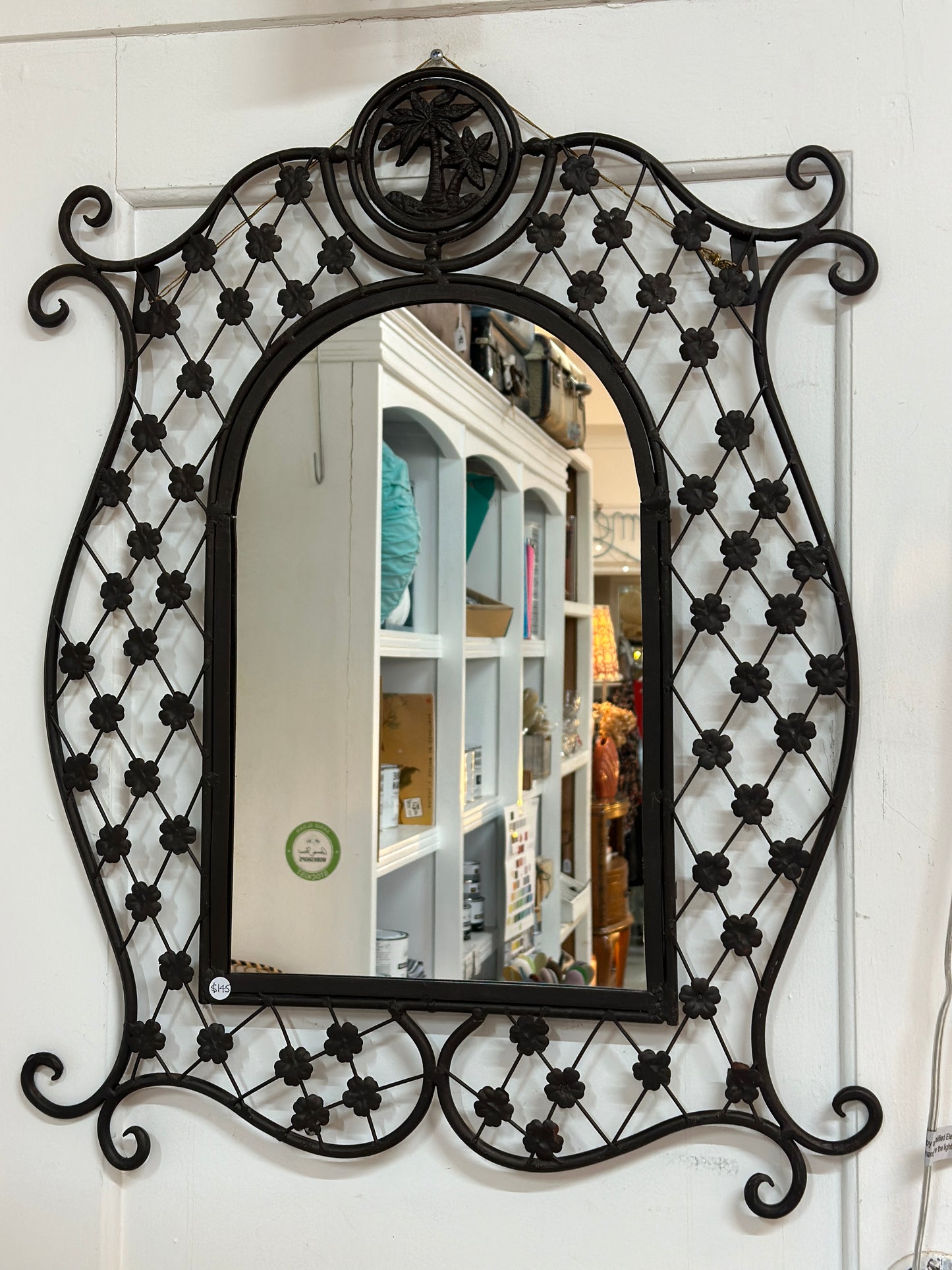 Wrought iron mirror with Palm Springs vibe