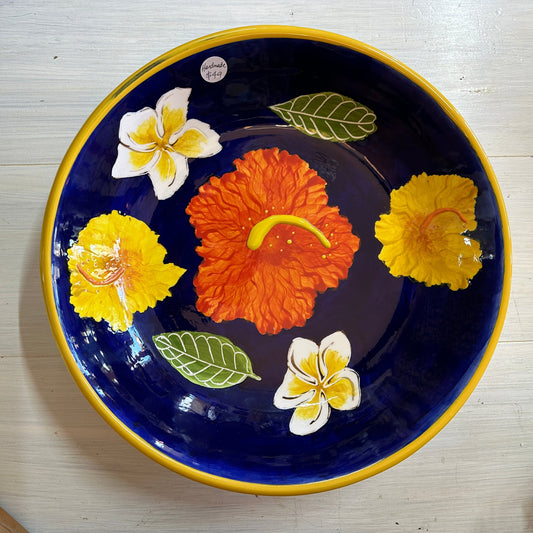 Ceramic serving bowl with tropical design